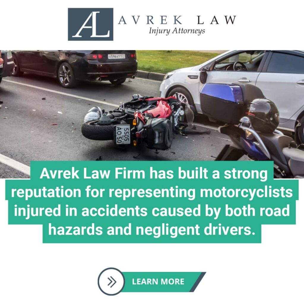 motorcycle in accident caused by road hazards and negligent drivers